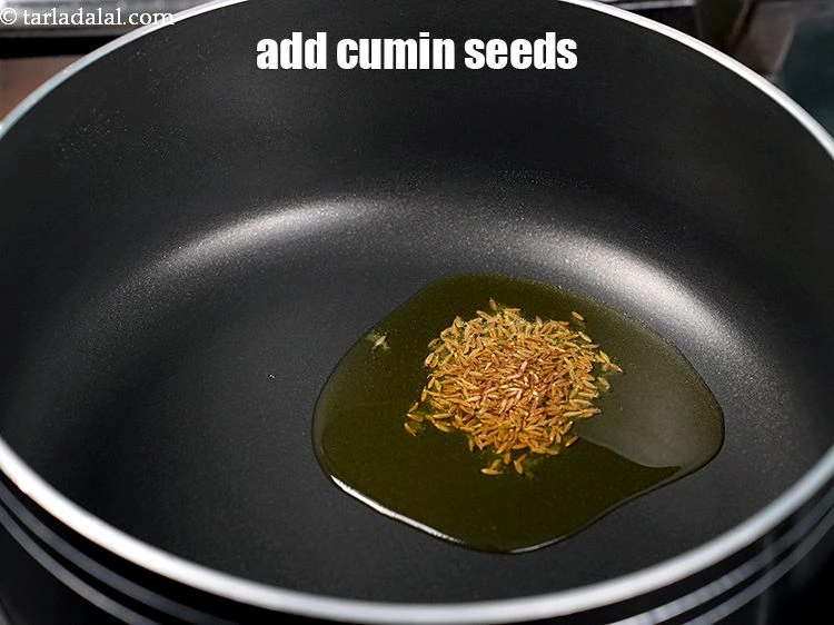 Step 12 – <p>Add&nbsp;1/2 tsp&nbsp;<a href="https://www.tarladalal.com/glossary-cumin-seeds-jeera-zeera-381i">cumin seeds (jeera)</a>.&nbsp;</p>