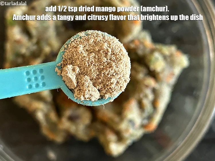 Step 20 – <html><head></head><body><p>Add&nbsp;1/2 tsp&nbsp;<a href="glossary-dried-mango-powder-amchur-powder-148i">dried mango powder (amchur)</a>.&nbsp;Amchur adds a tangy and citrusy flavor that brightens up …