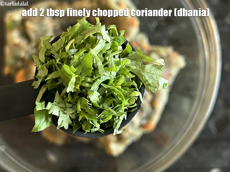 Step 21 – <html><head></head><body><p>Add&nbsp;2 tbsp&nbsp;finely&nbsp;<a href="glossary-chopped-coriander-783i">chopped coriander (dhania)</a>.</p></body></html>