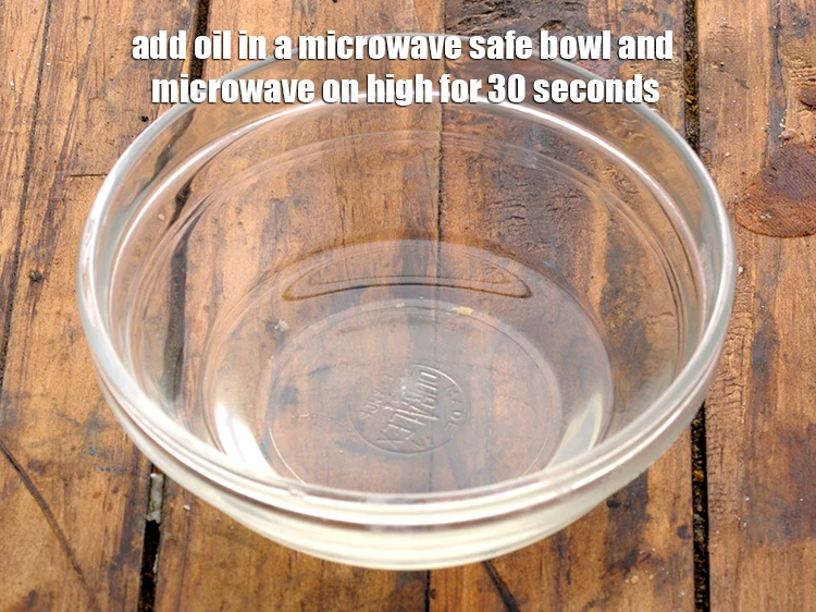 Step 11 – <p><span style="background-color:rgb(255,255,255);color:rgb(0,0,0);"><strong>For the tempering</strong>, add the </span><a href="https://www.tarladalal.com/glossary-oil-671i"><u>oil</u></a><span style="background-color:rgb(255,255,255);color:rgb(0,0,0);"> in a microwave safe bowl and …