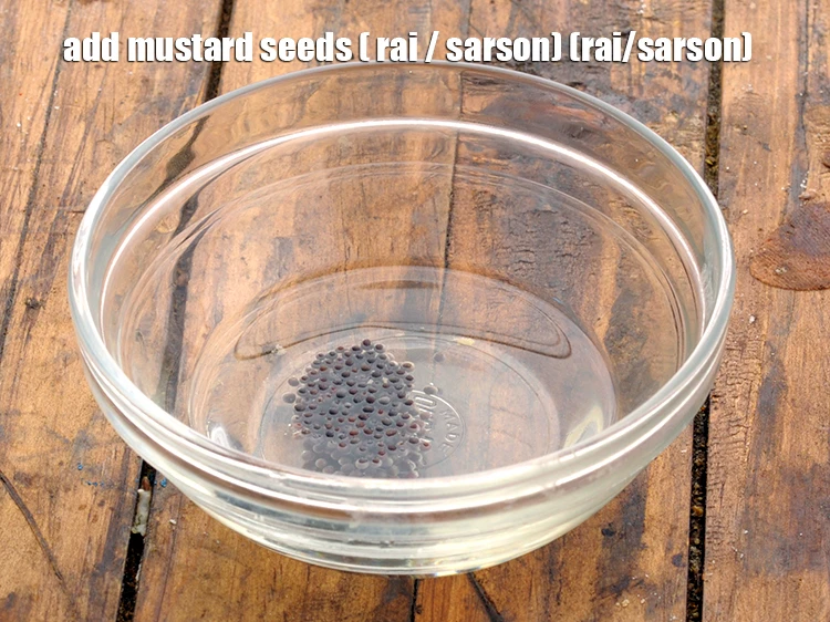 Step 12 – <p style="margin-left:0px;">Add 1 tsp <a href="https://www.tarladalal.com/glossary-mustard-seeds-sarson-rai-sarson-ke-beej-525i"><u>mustard seeds ( rai / sarson) </u></a>(rai/sarson).</p>