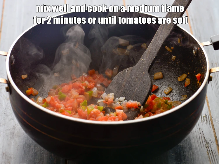 Step 10 – <p>Mix well and <strong>cook</strong> on a medium flame for 2 minutes or until tomatoes are …