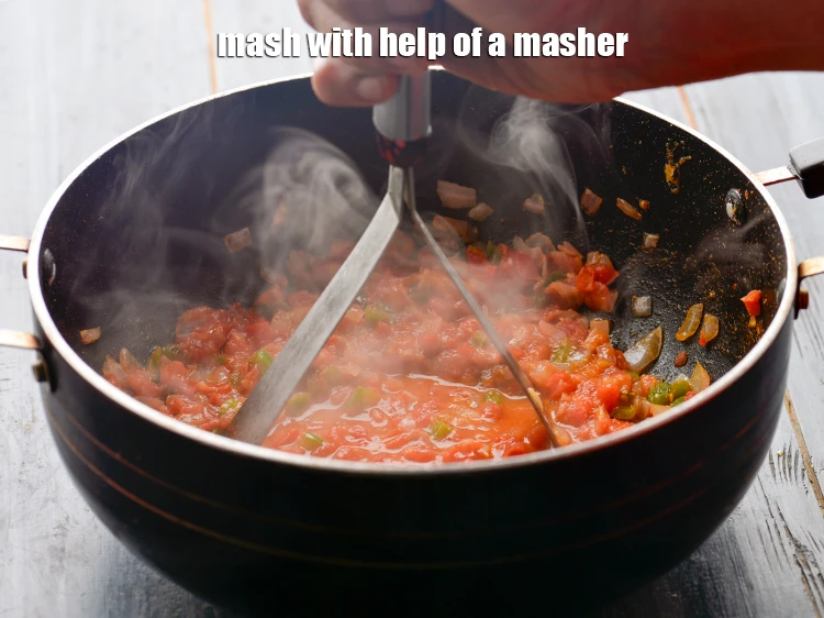 Step 11 – <p><strong>Mash</strong> with help of a masher and also, stir occasionally.</p>