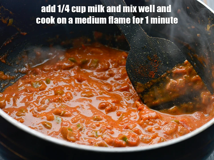 Step 16 – <p>&nbsp;Add the 1/4 cup <a href="https://www.tarladalal.com/glossary-milk-doodh-full-cream-milk-514i"><u>milk</u></a><u>. </u>Mix the&nbsp;<strong>Pav Bhaji Fondue&nbsp;</strong>well and cook on a medium …