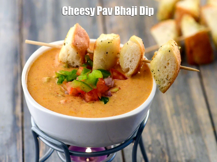 Step 23 – <p><strong>pav bhaji fondue</strong> tastes nice when served with <a href="https://www.tarladalal.com/herb-bread-indian-herb-toast-39816r"><strong>herbed bread</strong></a>.</p>