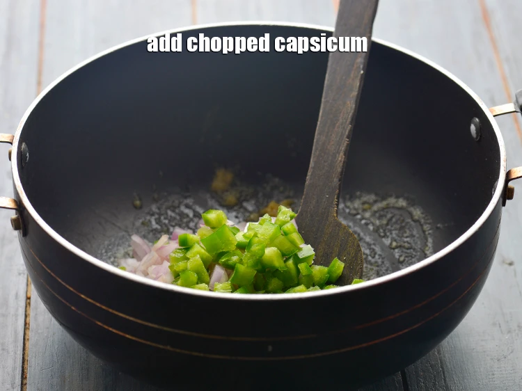 Step 6 – <p>Add the 1/4 cup <a href="https://www.tarladalal.com/glossary-capsicum-shimla-mirch-bell-pepper-163i#ing_2311"><u>chopped capsicum</u></a><u>.</u></p>
