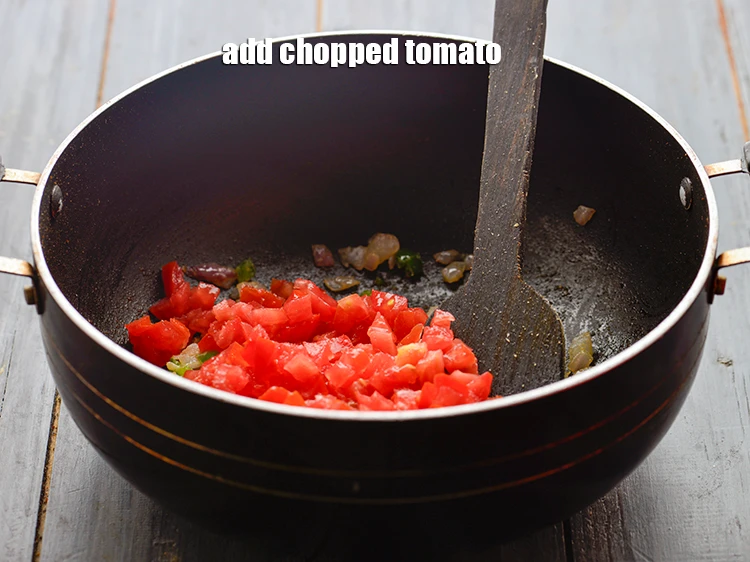Step 8 – <p>Add the 3/4 cup <a href="https://www.tarladalal.com/glossary-tomatoes-tamatar-639i#ing_2361"><u>chopped tomato</u></a>. You can also add boiled mixed vegetables like …