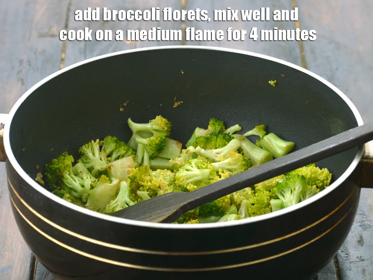 Step 5 – <p><span style="background-color:rgb(255,255,255);color:rgb(0,0,0);">Add the </span>1 cup chopped <a href="https://www.tarladalal.com/glossary-broccoli-232i#ing_2386"><u>chopped broccoli</u></a><span style="background-color:rgb(255,255,255);color:rgb(0,0,0);"> florets, mix well and<strong> cook …