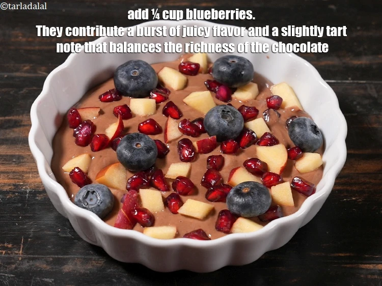 Step 11 – <p>Add ¼ cup <a href="https://www.tarladalal.com/glossary-blueberry-blueberries-1216i">blueberries</a>.&nbsp;They contribute a burst of juicy flavor and a slightly tart …
