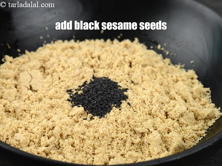 Step 22 – <p>Add 4 tsp&nbsp;<a href="https://www.tarladalal.com/glossary-black-sesame-seeds-kala-til-kale-til-862i">black sesame seeds (kala til)</a>.&nbsp;</p>