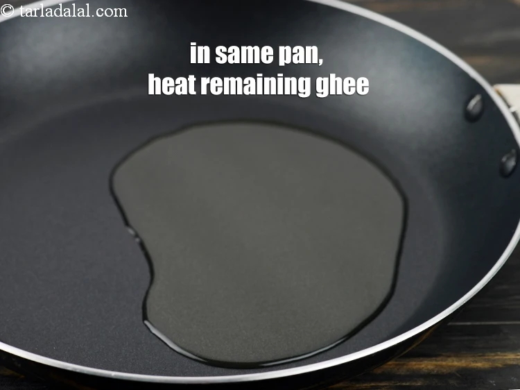 Step 7 – <p>In the same broad non-stick pan, heat the remaining 3 tbsp of ghee.</p>