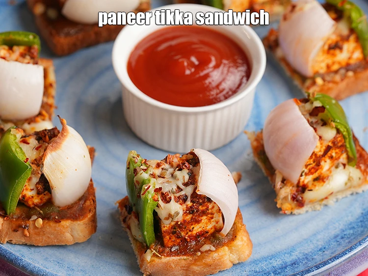 Step 24 – <p>Cut the toast into 4 pieces. Serve <strong>paneer tikka toast</strong> immediately.</p>