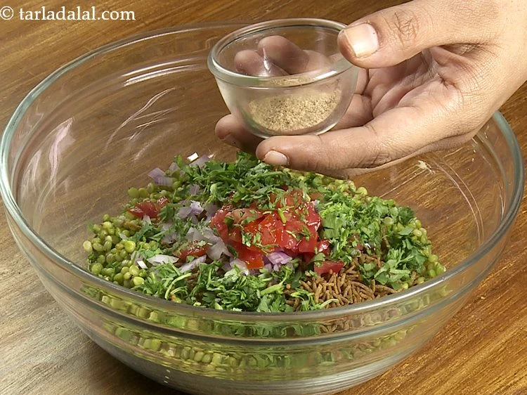 Step 9 – <p>Add 1/2 tsp <a href="https://www.tarladalal.com/glossary-chaat-masala-300i"><u>chaat masala</u></a>. I have used <a href="https://www.tarladalal.com/chaat-masala-homemade-chaat-masala-recipe-164r">homemade chaat masala</a>&nbsp;for this <strong>ponkh …