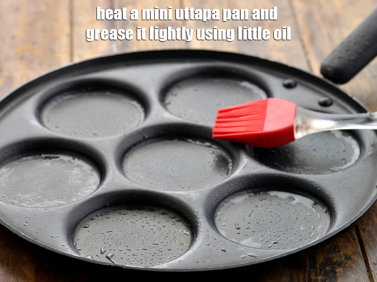 Step 13 – <p>To prepare the <strong>Mini Rava Vegetable Pankcake</strong>, heat a <strong>mini uttapa pan</strong> and grease it …