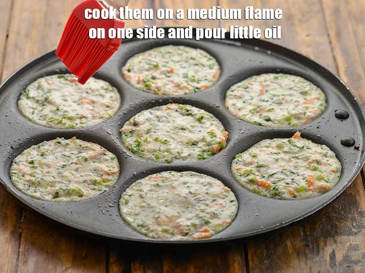 Step 15 – <p><strong>Cook</strong> them on a medium flame on one side. and pour little oil.</p>