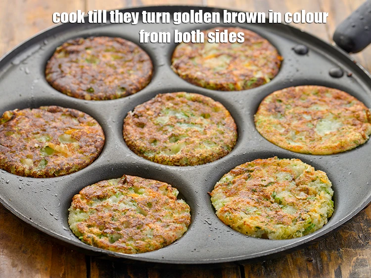 Step 16 – <p><strong>Flip and Cook</strong> till they turn golden brown in colour from both sides.</p>