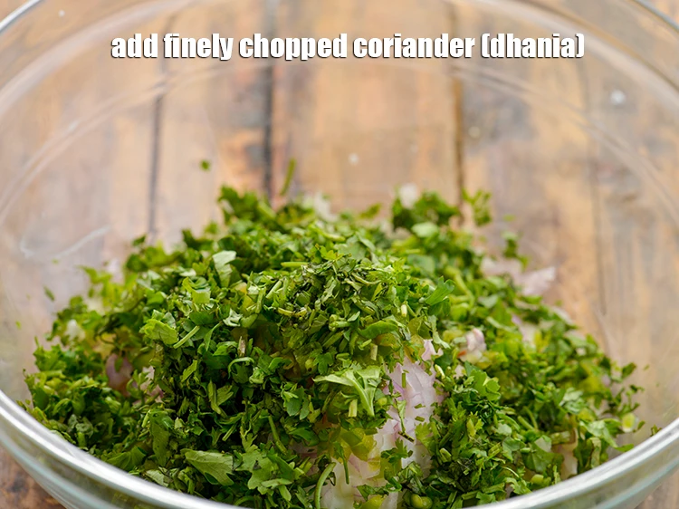 Step 6 – <p>Add 3 tbsp finely <a href="https://www.tarladalal.com/glossary-coriander-dhania-kothmir-369i#ing_2365"><u>chopped coriander (dhania)</u></a>. Instead of adding all the vegetables to …