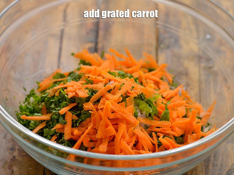 Step 7 – <p>Add 2 1/2 tbsp <a href="https://www.tarladalal.com/glossary-carrot-gajar-gajjar-253i#ing_2385"><u>grated carrot</u></a>. Also, you can add grated beetroot or cabbage.</p>