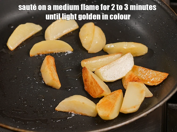 Step 12 – <p>Sauté on a medium flame for 2 to 3 minutes until light golden in colour.</p>