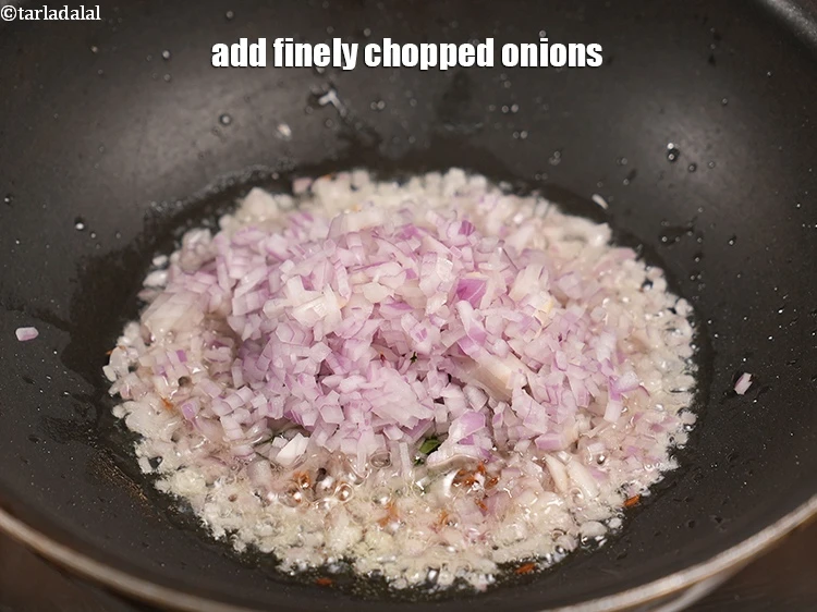 Step 21 – <p>Add ½ cup finely&nbsp;<a href="https://www.tarladalal.com/glossary-chopped-onions-722i">chopped onions</a>.</p>