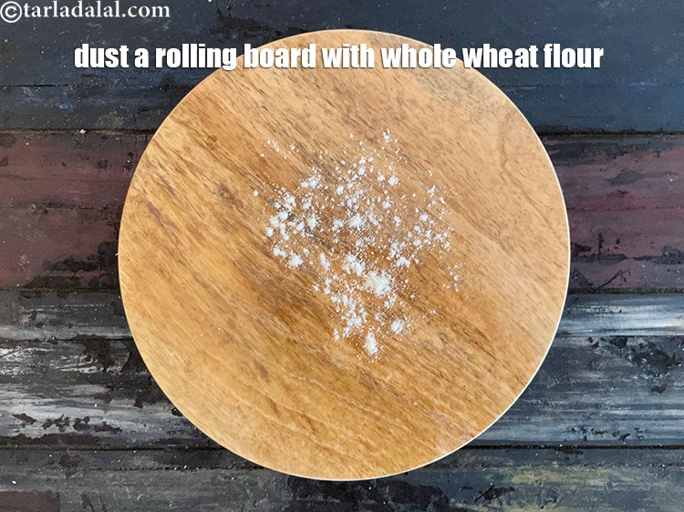Step 17 – <p>Dust a rolling board with whole wheat flour.</p>
