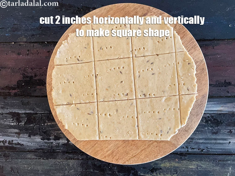 Step 22 – <p>Cut 2 inches horizontally and vertically to make square shapes on the dough. Repeat with …