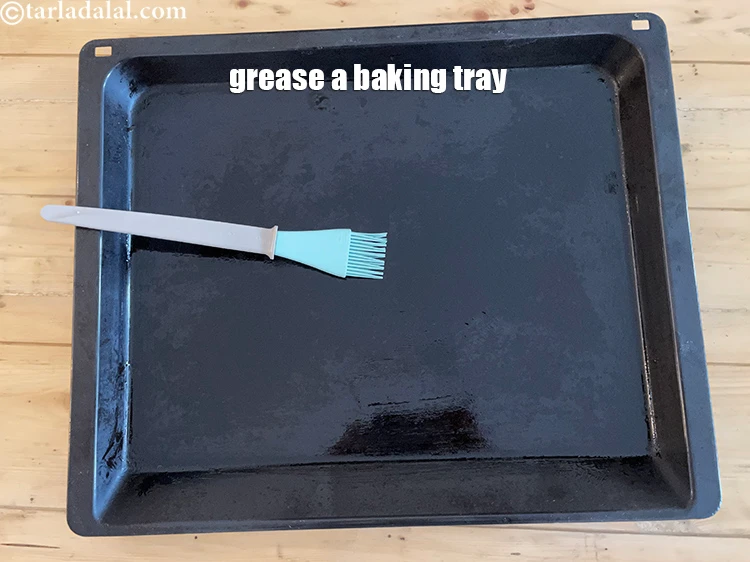 Step 23 – <p>Pre heat an oven. Greae the baking tray with oil.</p>