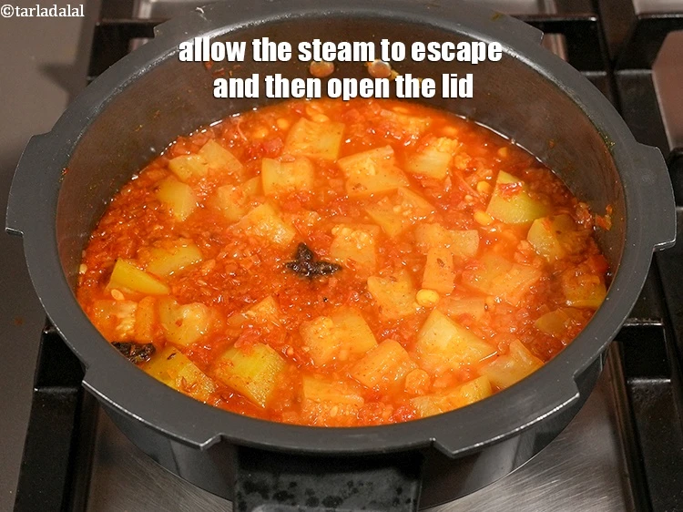 Step 28 – <p>Allow the steam to escape and then open the lid.</p>