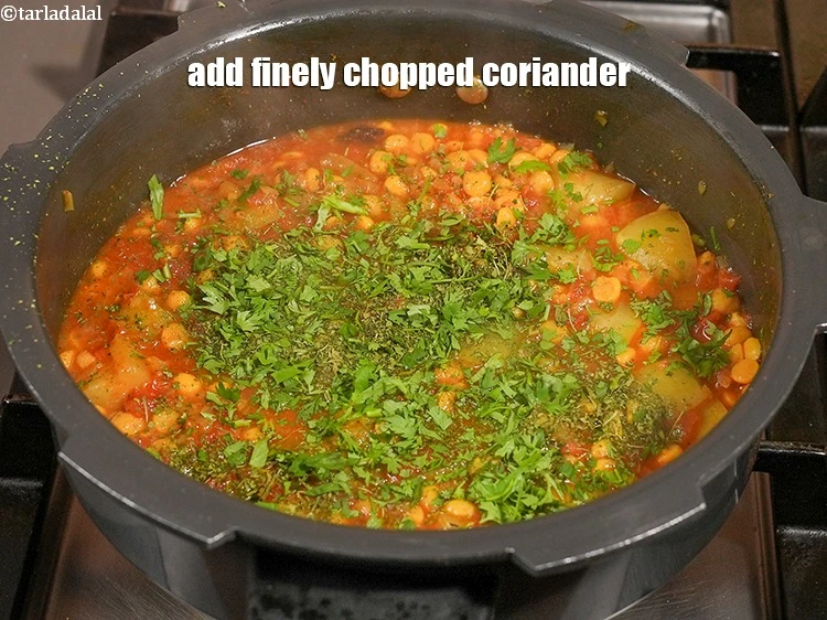 Step 30 – <p>Add 2 tbsp finely <a href="https://www.tarladalal.com/glossary-chopped-coriander-783i">chopped coriander (dhania)</a>.</p>