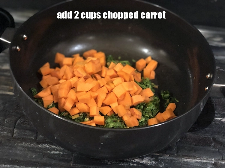 Step 11 – <p>Add the 2 cups <a href="https://www.tarladalal.com/glossary-carrot-gajar-gajjar-253i#ing_2333"><u>carrot cubes</u></a>.&nbsp;<a href="https://www.tarladalal.com/recipes-using-carrot-gajar-gajjar-253">Carrots</a>&nbsp;have the nutrient Beta Carotene which is a …