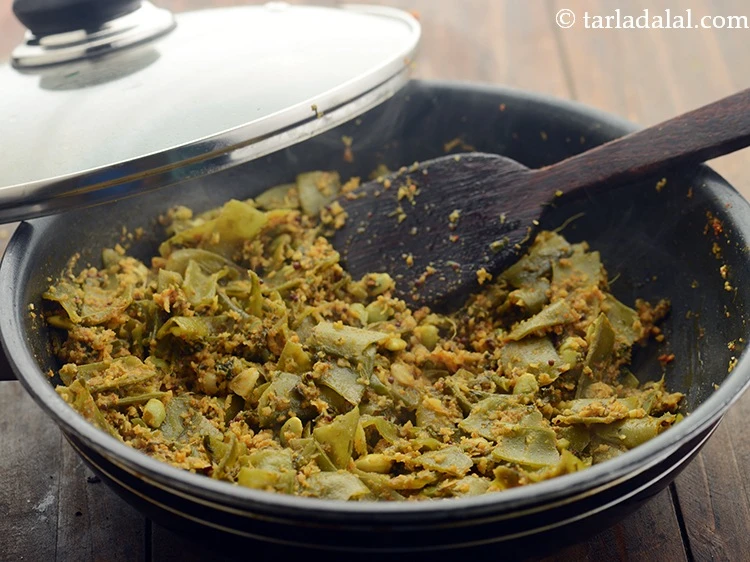 Step 16 – <p>Mix well and cover and cook on medium flame for 20 minutes or till the …