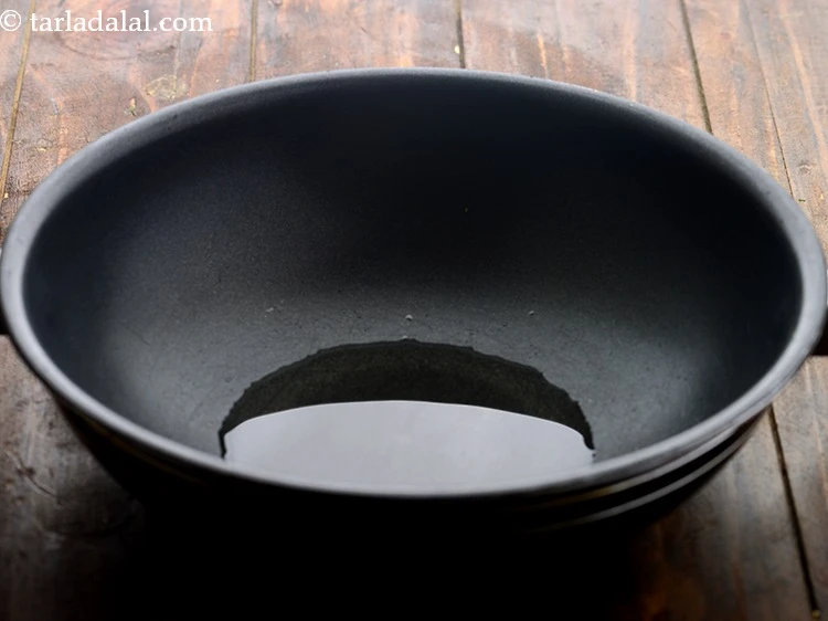 Step 5 – <p>Further, to proceed&nbsp; making <strong>valor muthia nu shaak</strong>, heat oil in a non-stick kadhai. You …