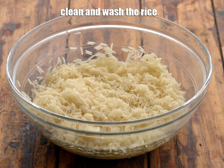 Step 3 – <p><span style="background-color:rgb(255,255,255);color:rgb(0,0,0);">Clean and <strong>wash </strong>the </span>1 cup <a href="https://www.tarladalal.com/glossary-long-grain-rice-basmati-chawal-basmati-rice-535i"><u>long grain rice (basmati chawal)</u></a><span style="background-color:rgb(255,255,255);color:rgb(0,0,0);">.</span></p>