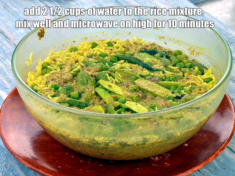 Step 8 – <p><span style="background-color:rgb(255,255,255);color:rgb(0,0,0);">Add 2 1/2 cups of <strong>water </strong>to the rice mixture, mix well and <strong>microwave</strong> …