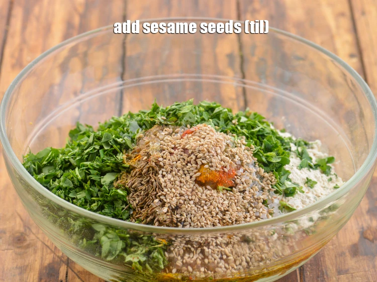 Step 14 – <p>Add the 1 tbsp <a href="https://www.tarladalal.com/glossary-sesame-seeds-til-gingelly-seeds-612i"><u>sesame seeds (til)</u></a>. It gives a mild nutty flavour to …