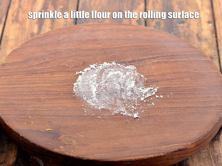 Step 20 – <p>Sprinkle a little <a href="https://www.tarladalal.com/glossary-whole-wheat-flour-gehun-ka-atta-gehun-ka-aata-429i"><u>whole wheat flour (gehun ka atta)</u></a>r on the rolling surface.</p>