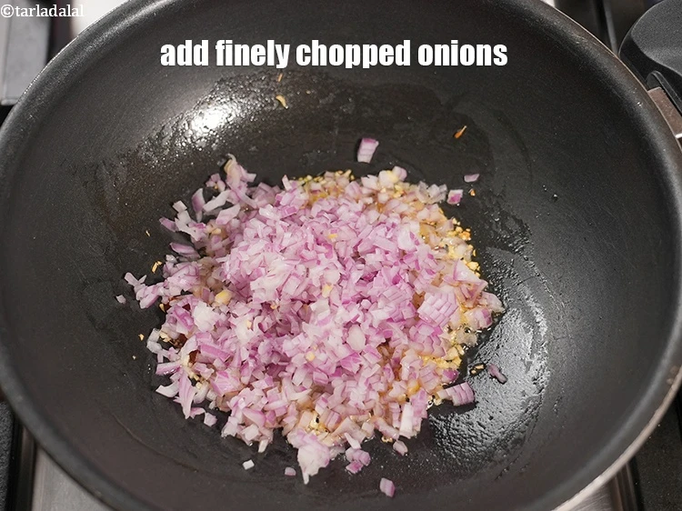 Step 15 – <p>Add ½ cup finely&nbsp;<a href="https://www.tarladalal.com/glossary-chopped-onions-722i">chopped onions</a>.</p>