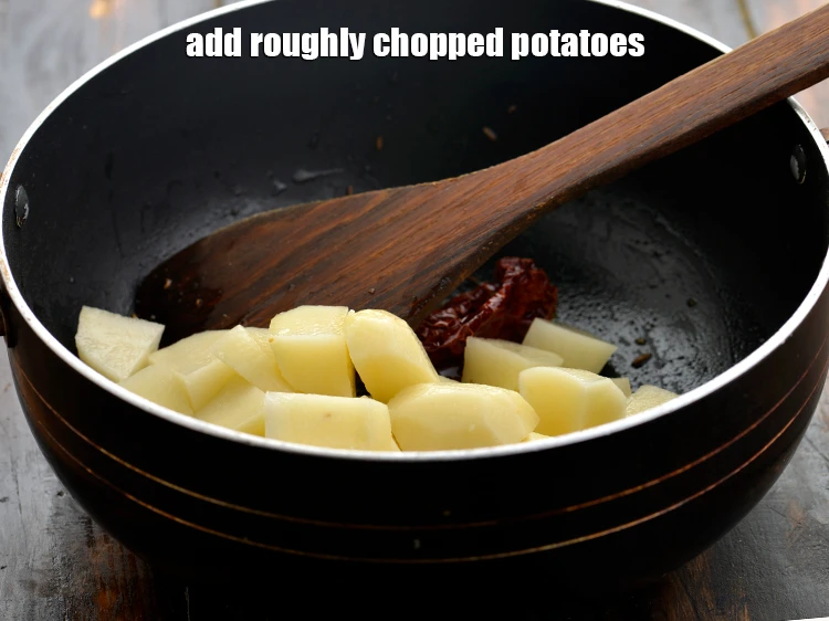 Step 13 – <p>Add the 1 cup roughly <a href="https://www.tarladalal.com/glossary-potatoes-aloo-alu-batata-710i#ing_2367"><u>chopped potatoes</u></a>. You can even chop the potatoes into …