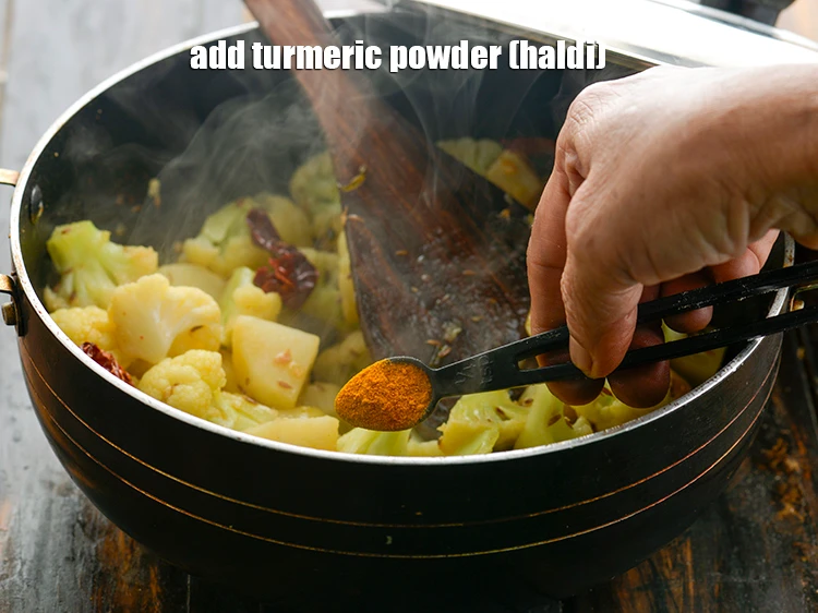 Step 18 – <p>Add the 1/4 tsp <a href="https://www.tarladalal.com/glossary-turmeric-powder-haldi-645i"><u>turmeric powder (haldi)</u></a>.&nbsp;</p>