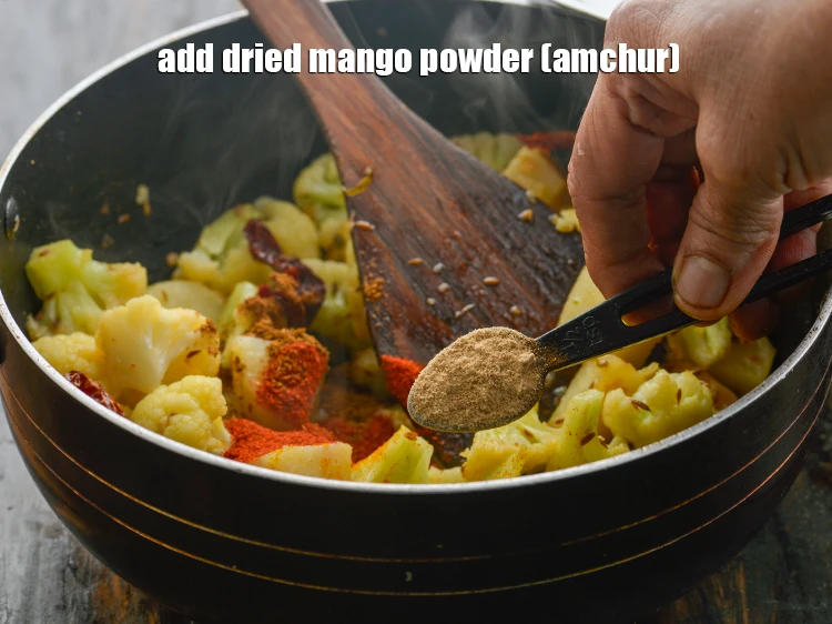 Step 21 – <p>Add the 1/2 tsp <a href="https://www.tarladalal.com/glossary-dried-mango-powder-amchur-powder-148i"><u>dried mango powder (amchur)</u></a>. If you don’t have amchur then …