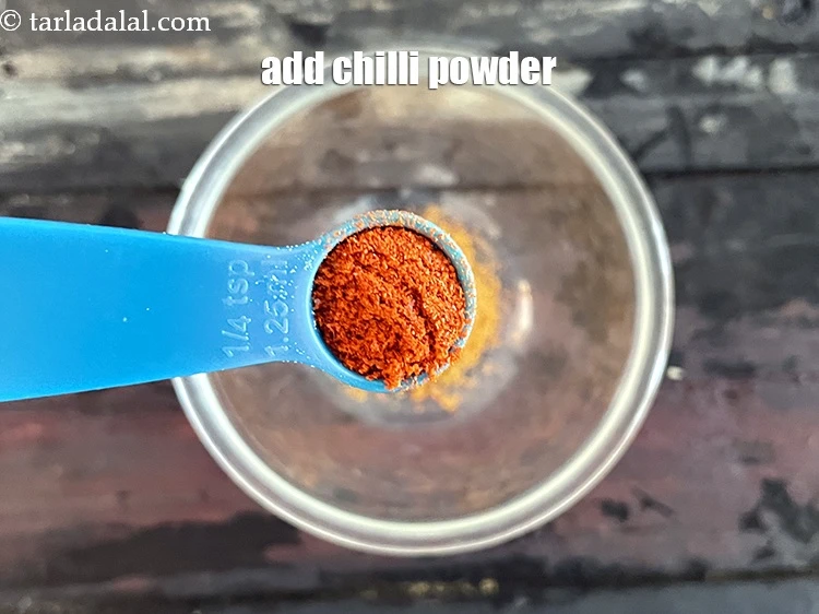 Step 5 – <p>Add&nbsp;1/4 tsp&nbsp;<a href="glossary-chilli-powder-red-chilli-powder-339i">chilli powder</a>.</p>