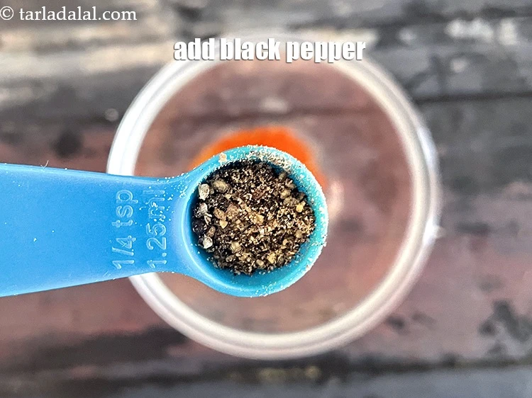 Step 6 – <p>Add&nbsp;1/8 tsp&nbsp;<a href="glossary-freshly-ground-black-pepper-kalimirch-powder-kali-mirch-ka-powder-567i">freshly ground black pepper (kalimirch)</a>.</p>
