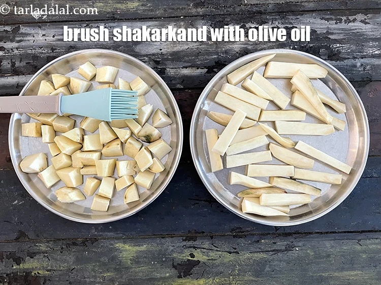 Step 12 – <p>Brush the shakarkand with 1 tsp <a href="https://www.tarladalal.com/glossary-olive-oil-451i"><u>olive oil</u></a>.</p>