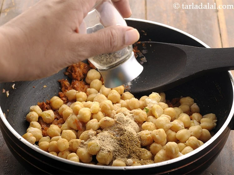 Step 22 – <p>Add freshly ground pepper powder and 1/2 cup of water&nbsp;</p>