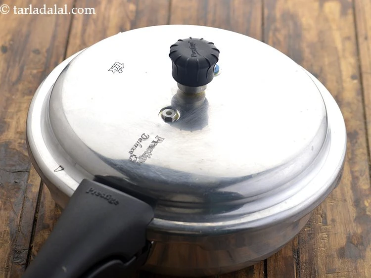 Step 5 – <p>Pressure cook for 3 whistles</p>