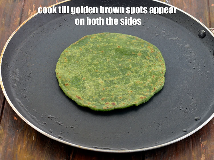 Step 13 – <p><span style="background-color:rgb(255,255,255);color:rgb(0,0,0);">Cook till golden brown spots appear on both the sides.</span></p>