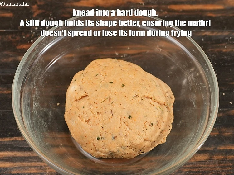 Step 17 – <p>Knead into a hard dough. A stiff dough holds its shape better, ensuring the mathri …