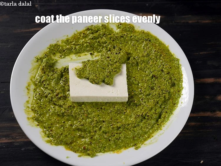 Step 14 – <p>Coat the paneer slices evenly using the paste on all the sides.</p>