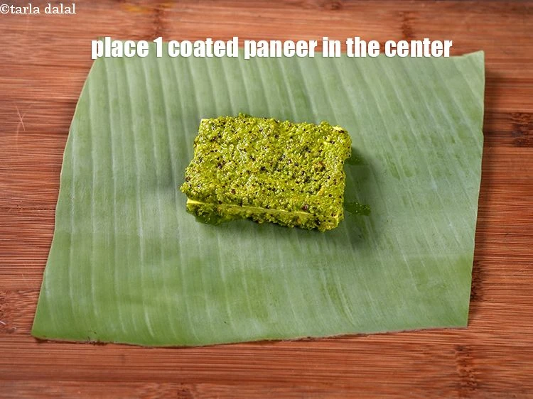 Step 17 – <p>Place 1 coated paneer in the center of the leaf.</p>