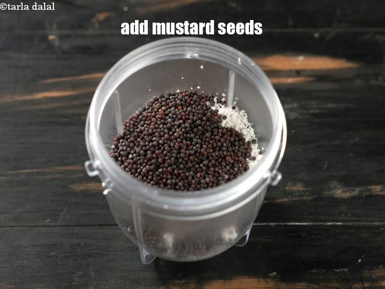 Step 4 – <p>Add 1½ tbsp <a href="https://www.tarladalal.com/glossary-mustard-seeds-sarson-rai-sarson-ke-beej-525i">mustard seeds ( rai / sarson)</a>.</p>